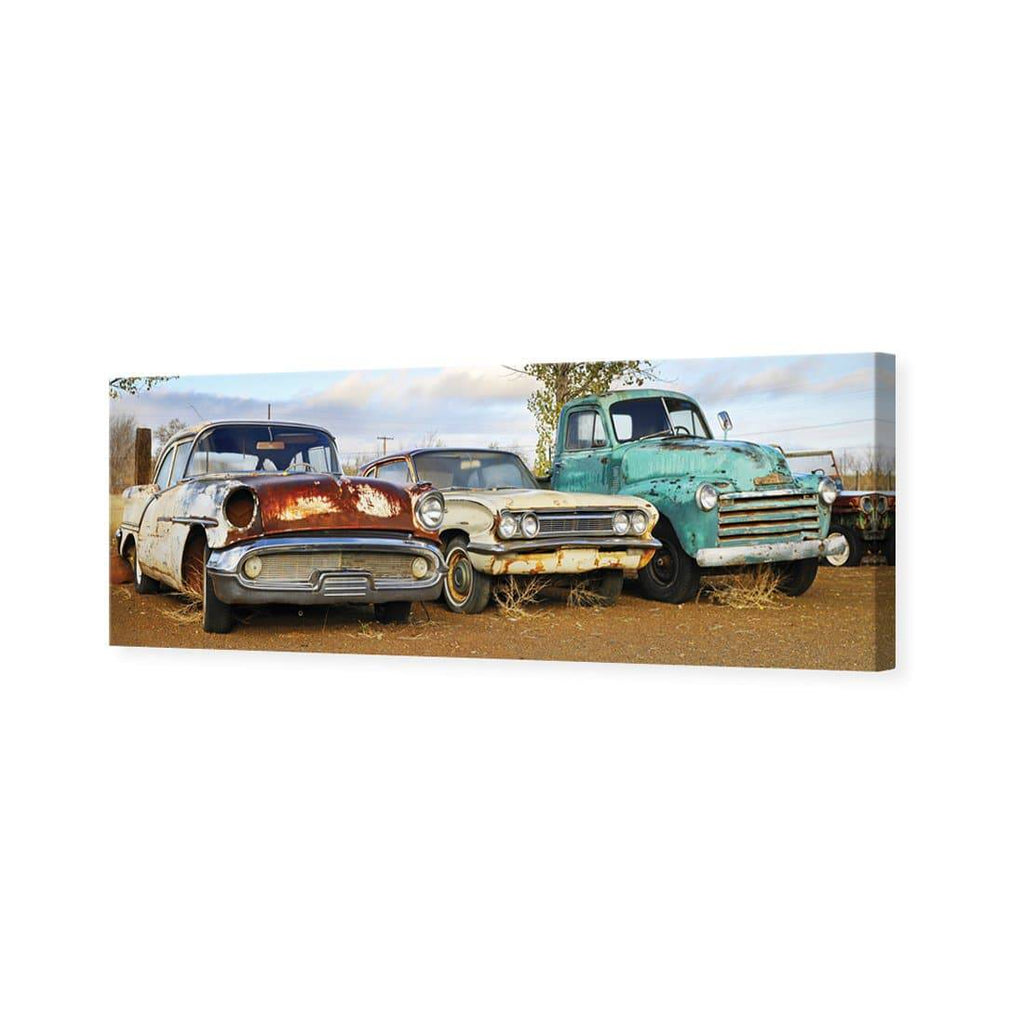 Row Of Rusty Cars Canvas Art